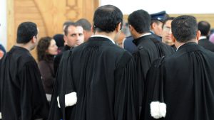 Lawyers are pictured at court in Casablanca on January 28, 2011 after the court postponed the verdict to February 11, 2011, in the trial of seven Sahrawi militants. The militants were arrested in October of 2009 at the airport in Casablanca on their return from Tindouf, in southern Algeria, where there is a strong pro-independence movement 'le Polisario' for the Western Sahara. The Polisario Front, with the support of Algiers, wants a referendum on self-determination, with independence as one of the options. AFP PHOTO / ABDELHAK SENNA (Photo credit should read ABDELHAK SENNA/AFP/Getty Images)